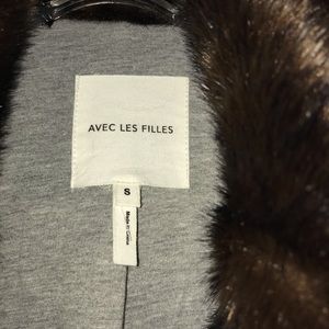 Avec les filles faux fur mink 3/4 length coat.